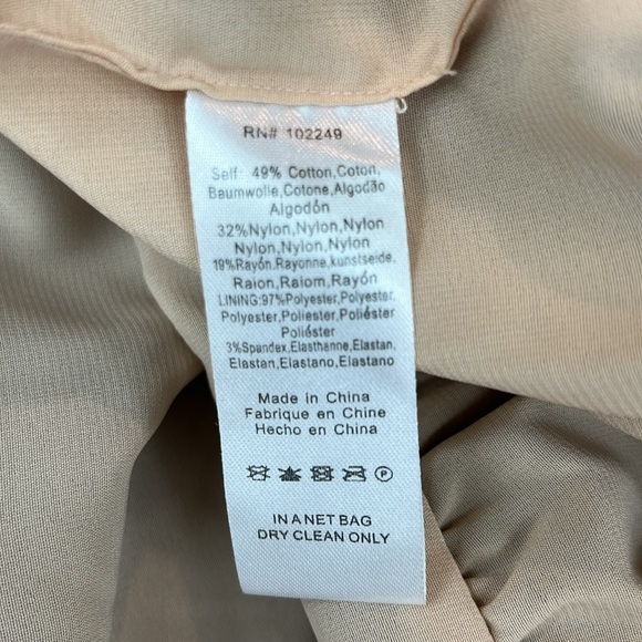 Black netted lace dress with tan lining the whole dress. - Picture 3 of 7